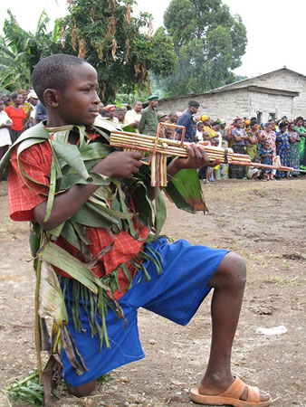 boy plays with toy gun