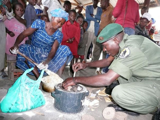 cooking with briquette on a stove